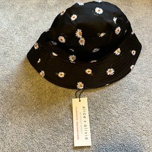 Alice & Olivia reversible bucket hat, white on one side, black with white flower